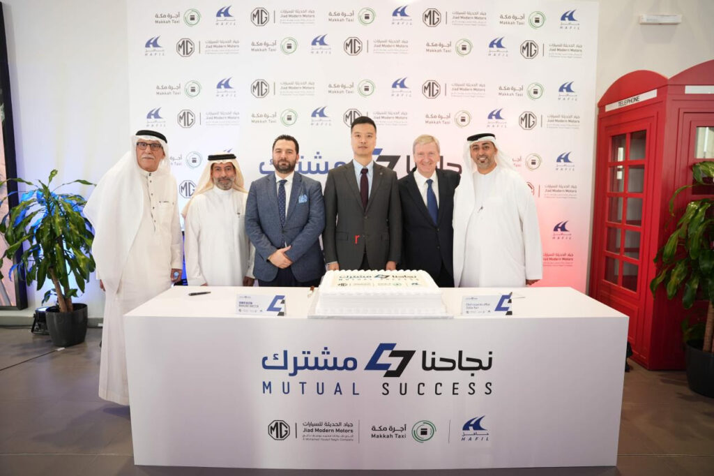 MG Motor Middle East, MG8 PHEV, Saudi Arabia taxis, Hafil Transport Company, Jiad Modern Motors, electric vehicles Saudi Arabia, hybrid cars GCC, Makkah taxi network, NEV strategy Middle East, sustainable mobility Saudi Arabia, plug in hybrid taxi, automotive news GCC, EV adoption Middle East, fleet mobility solutions, MG cars Saudi Arabia